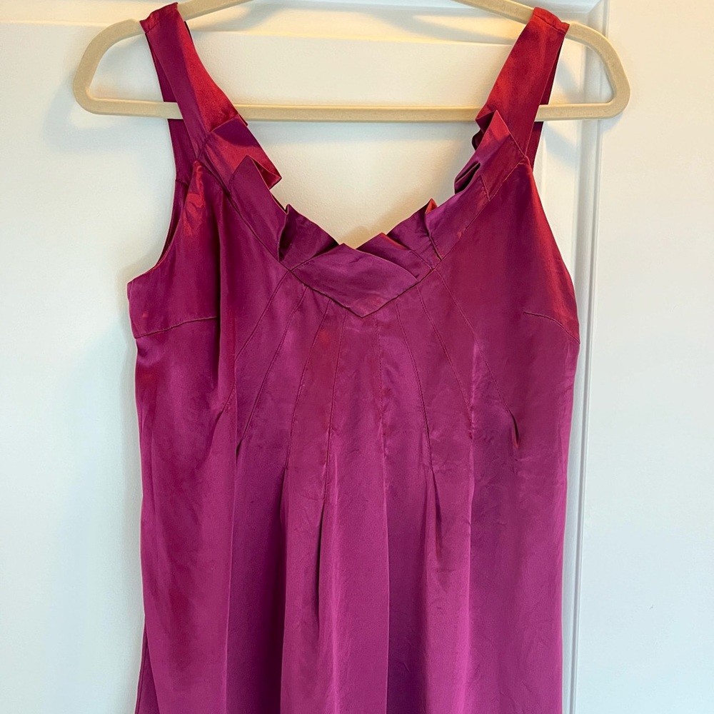 Gorgeous rich wine colored silk camisole top . Low pleated folds back .